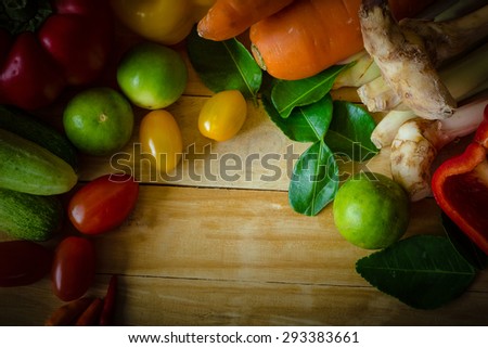 Vegetables from the garden resting on the wooden floor.(Vintage)