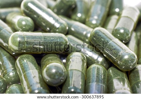 Spirulina capsules close up
