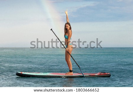 Similar – Image, Stock Photo Rainbow over a paddling pool in a garden