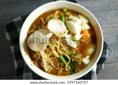 Mie tek-tek or mie dok-dok or boiled noodle soup with spices, thick and tasty gravy. Stok fotoğraf © 