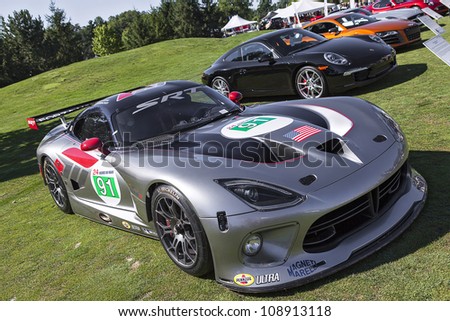 PLYMOUTH - JULY 29 : The 2013 Dodge Viper on display at the Concours D\'Elegance  July 29, 2012 in Plymouth, Michigan.