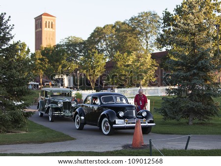 PLYMOUTH - JULY 29 : Vintage cars line up at the Concours D\'Elegance  July 29, 2012 in Plymouth, Michigan.