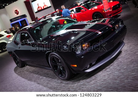 DETROIT - JANUARY 14 : A Dodge Challenger SRT on display at The North American International Auto Show  January 14, 2013 in Detroit, Michigan.