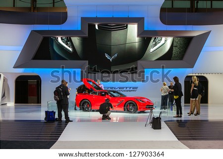 CHICAGO - FEBRUARY 7 : Members of the press inspect the new Chevrolet Corvette Concept at the Chicago Auto Show media preview February 7, 2013 in Chicago, Illinois.