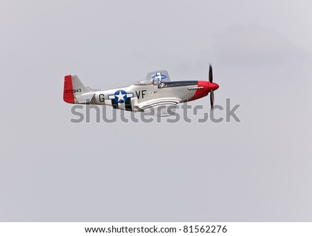 YPSILANTI - JULY 24th : A P-51 Mustang flys by the Thunder Over Michigan air show on July 24th, 2011 in Ypsilanti, Michigan.