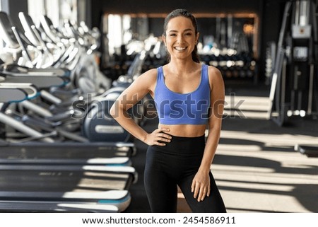 Similar – Image, Stock Photo Slim woman during hip workout near sea