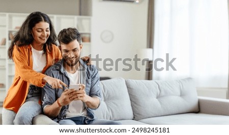 Similar – Image, Stock Photo Young man with mobile phone in the autumn park