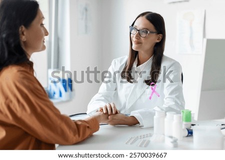 Similar – Image, Stock Photo Positive female patient sitting on bed in hospital