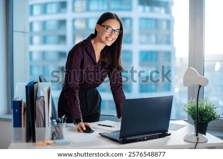 Similar – Image, Stock Photo Smiling businesswoman standing near gray wall