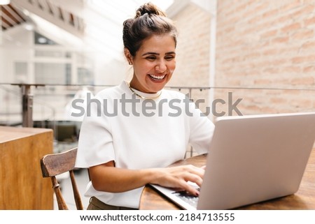 Similar – Image, Stock Photo Cheerful woman having video call