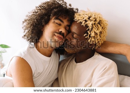 Similar – Image, Stock Photo Romantic black couple embracing on street