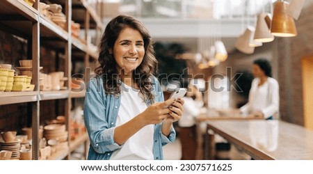 Similar – Image, Stock Photo Young craftswoman in her workshop