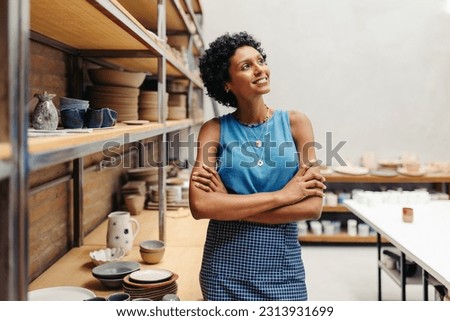 Similar – Image, Stock Photo Handicraft female artist with roller applying ink on plate for engraving