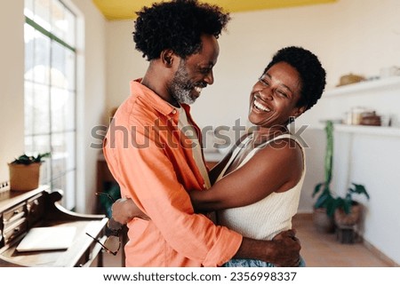 Similar – Image, Stock Photo Happy mature couple hugging in park