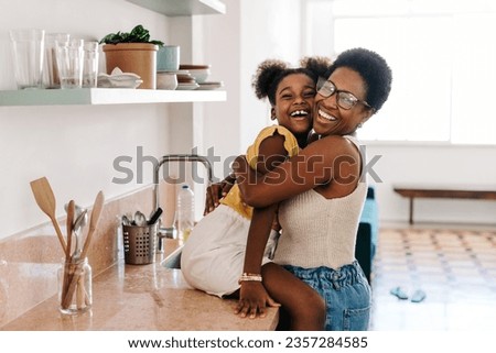 Similar – Image, Stock Photo Young mother hugging her baby