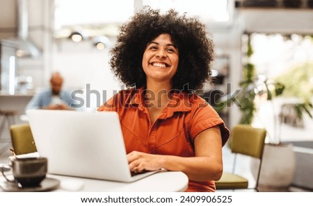 Similar – Image, Stock Photo Smiling woman using laptop in armchair