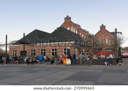 Amsterdam,netherlands-april 19, 2015: Westerpark Amsterdam people sitting on a terras