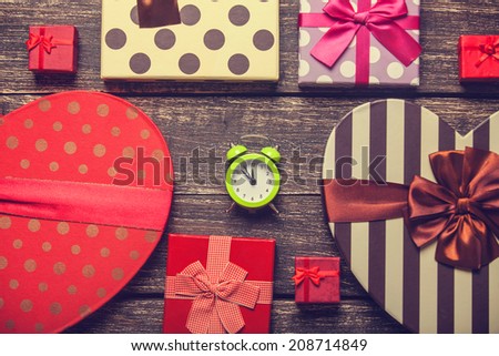 Retro alarm clock and christmas gifts around