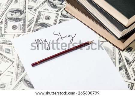 pencil and paper with My Story words and one hundred dollar bills