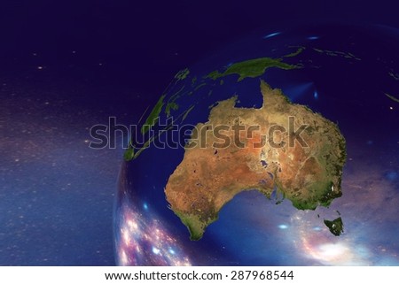 The Earth from space on the background with stars and galaxies showing Australia on globe in the day time; elements of this image furnished by NASA