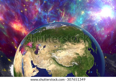 The Earth from space showing Russia, China, Asia on surrealistic background with stars and galaxies, elements of this image furnished by NASA, other orientations available