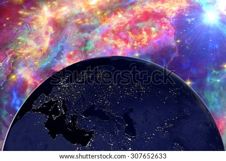 The Earth from space showing Europe in night on surrealistic background with galaxies, elements of this image furnished by NASA, other orientations available