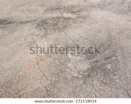 Asphalt surface, on of the road were demolished due to poor construction.