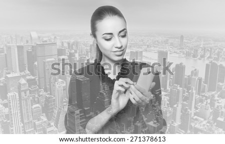 Double exposurecity and beautiful business woman folded her arms monochrome black and white photo