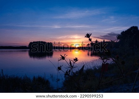 beautiful sunrise over a lake in Poland. Blue sky, white clouds . great view. Sielpia Wielka, Poland Zdjęcia stock © 