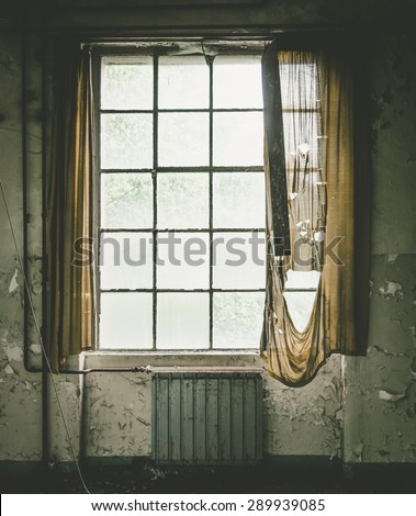 old window with curtain