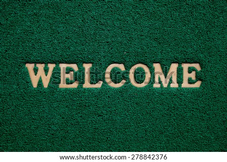 welcome  mat on the floor background
