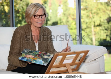 Woman artist at home
