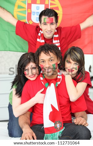 Group of friends supporting the Portuguese football team