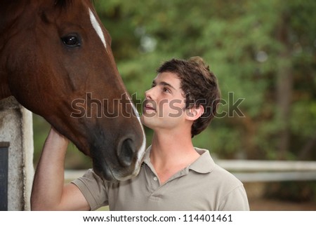 portrait of a young man with horse