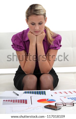 Market researcher staring at the results of her research
