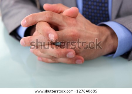 Human hands clasped