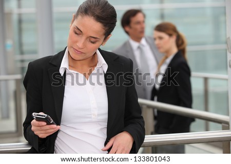 Woman reading message on mobile