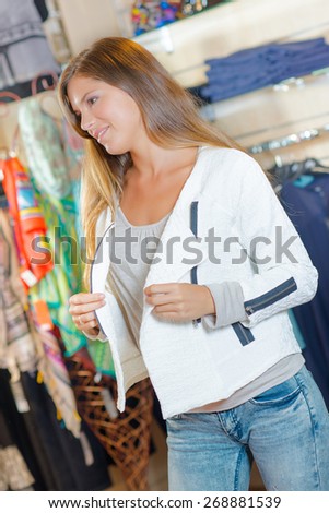 Trying on clothes in the store