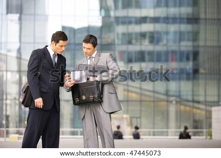 Sales people meeting outside the office