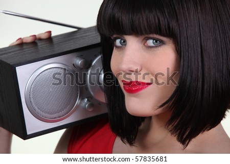 Portrait of a woman with radio
