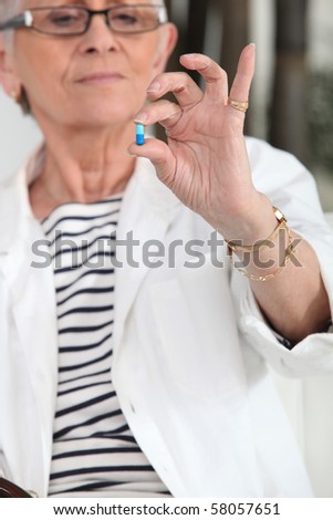 Senior woman with drugs