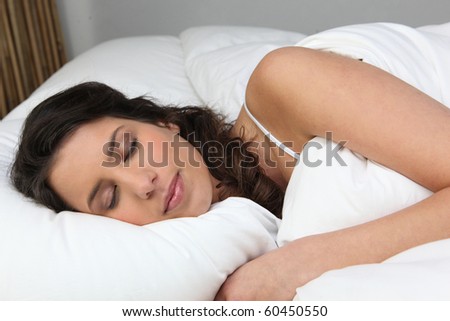 Young brown-haired woman asleep
