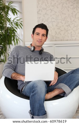 Man listening to music on computer