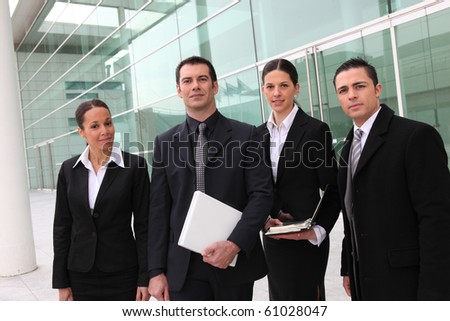 Business people in front of an agency