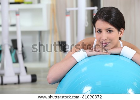 Young woman in sports room