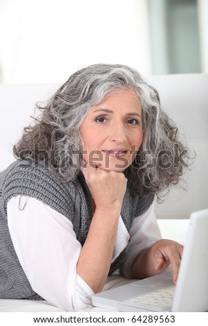 Senior woman in front of a laptop computer