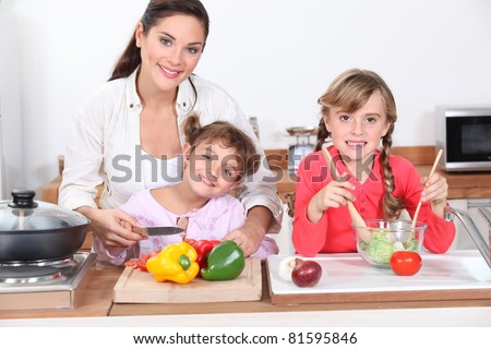 Kids cooking with their mother