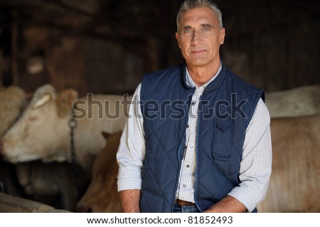 farmer in his cow farm