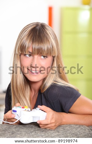 Girl playing on games console