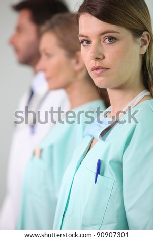 Young nurse and medical team